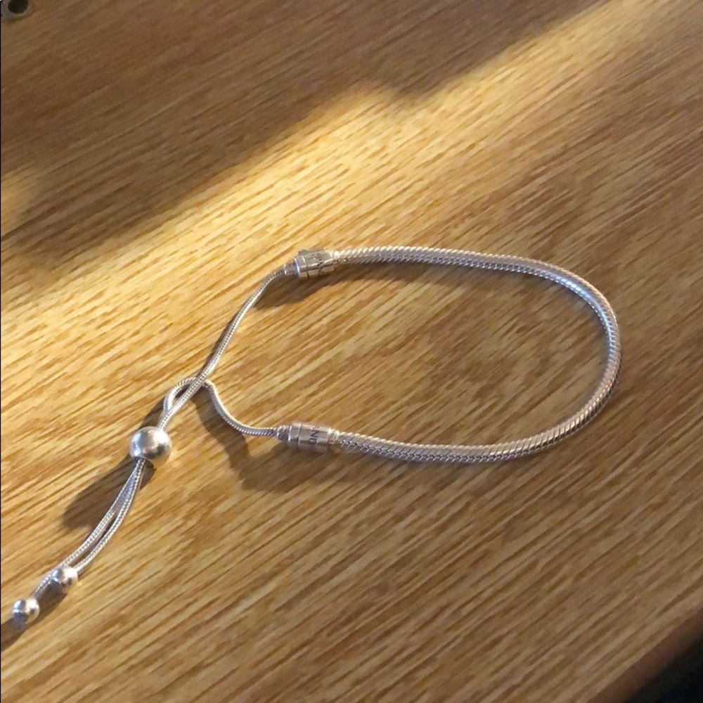 Adjustable pandora silver bracelet.GREAT CONDITION